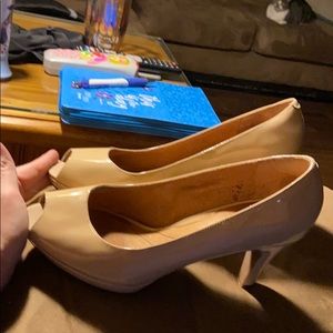 Gently used tan peep toe nude Clark’s heels